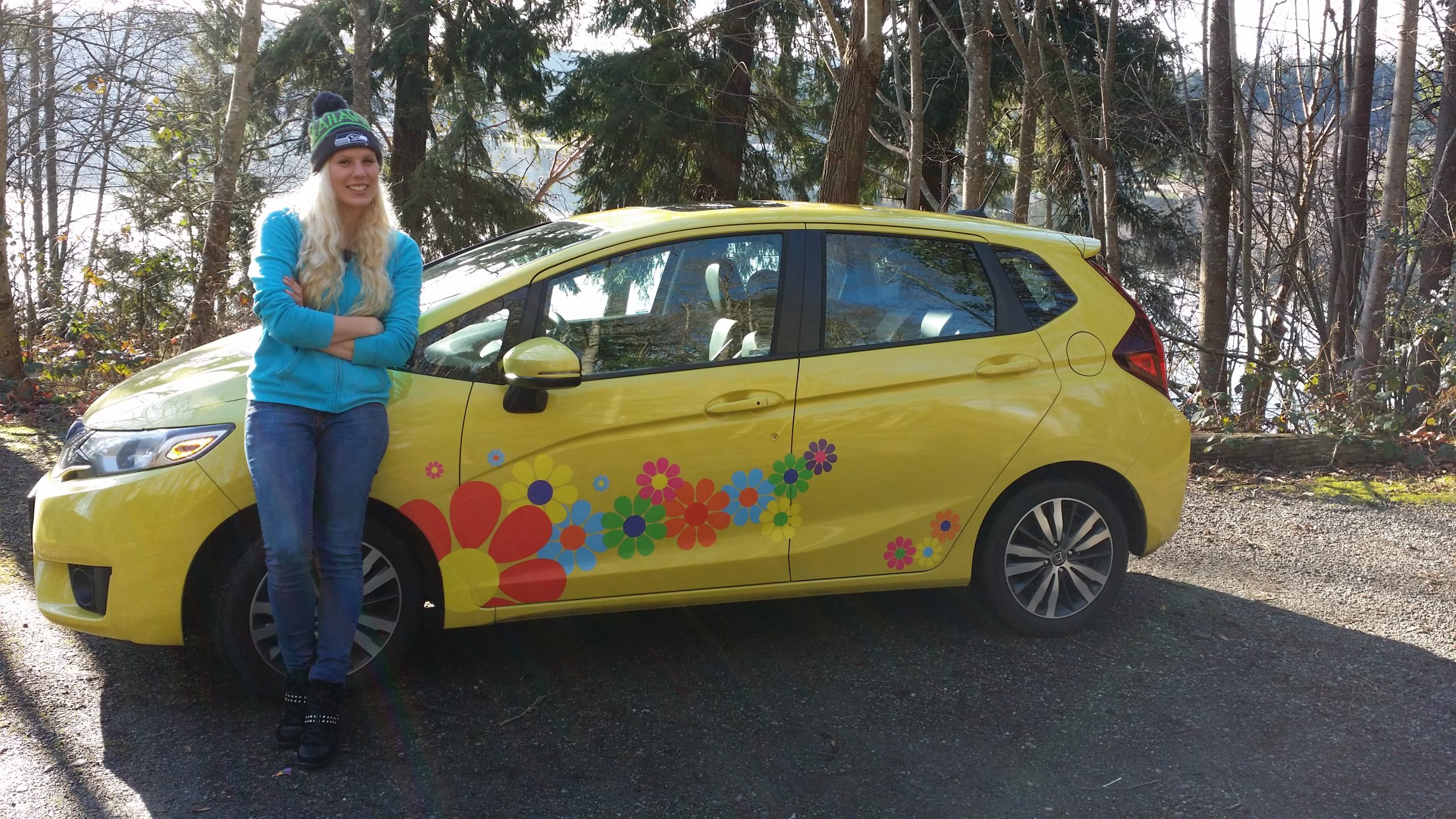Carrie and Yellow Honda Fit with her Flower Power Decals
