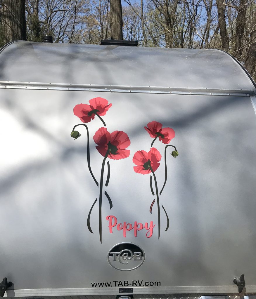 Girl Camper Teardrop Tab Trailer Red Poppy decals on front